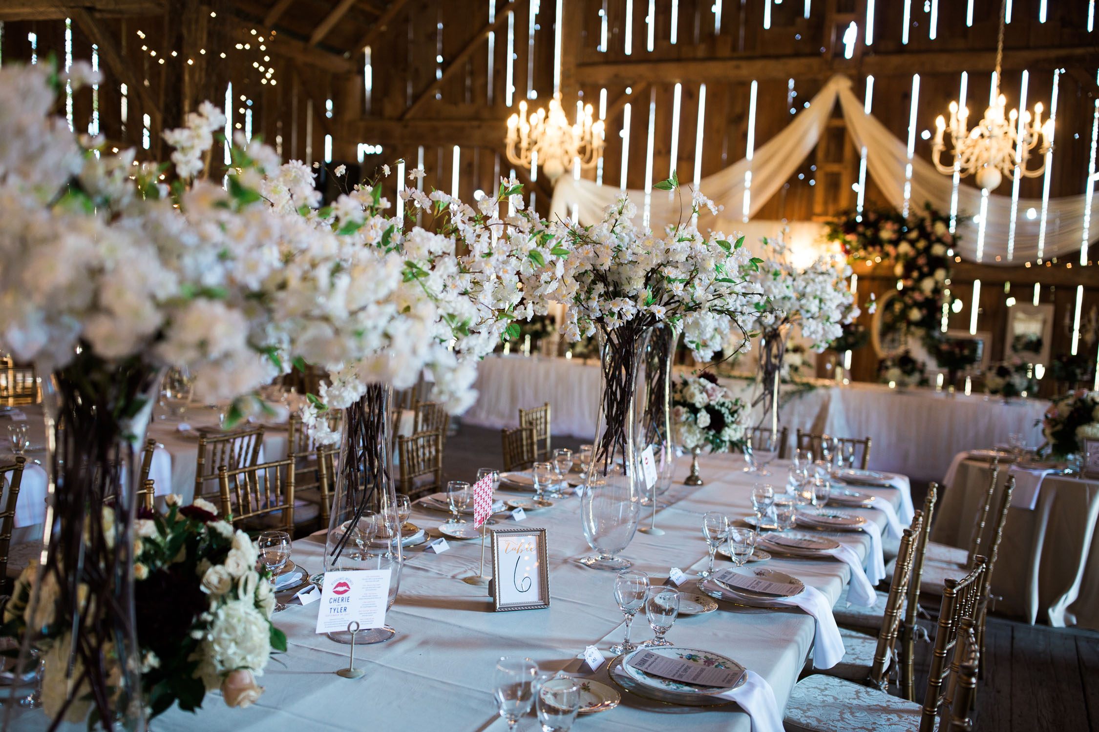 Gorgeous table setting in barn.