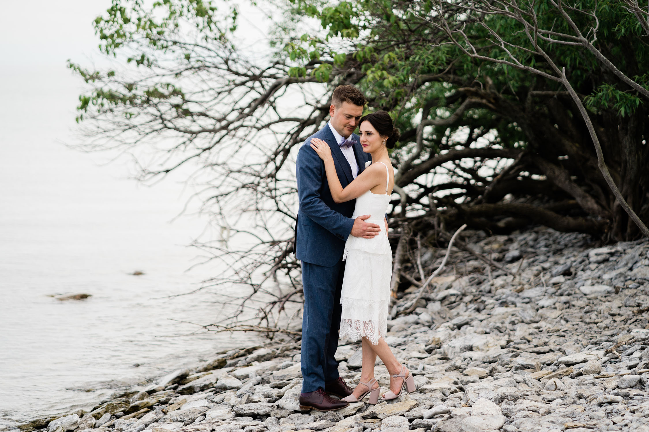Couple from Compass Rose wedding on Peters Point in Prince Edward County wedding.