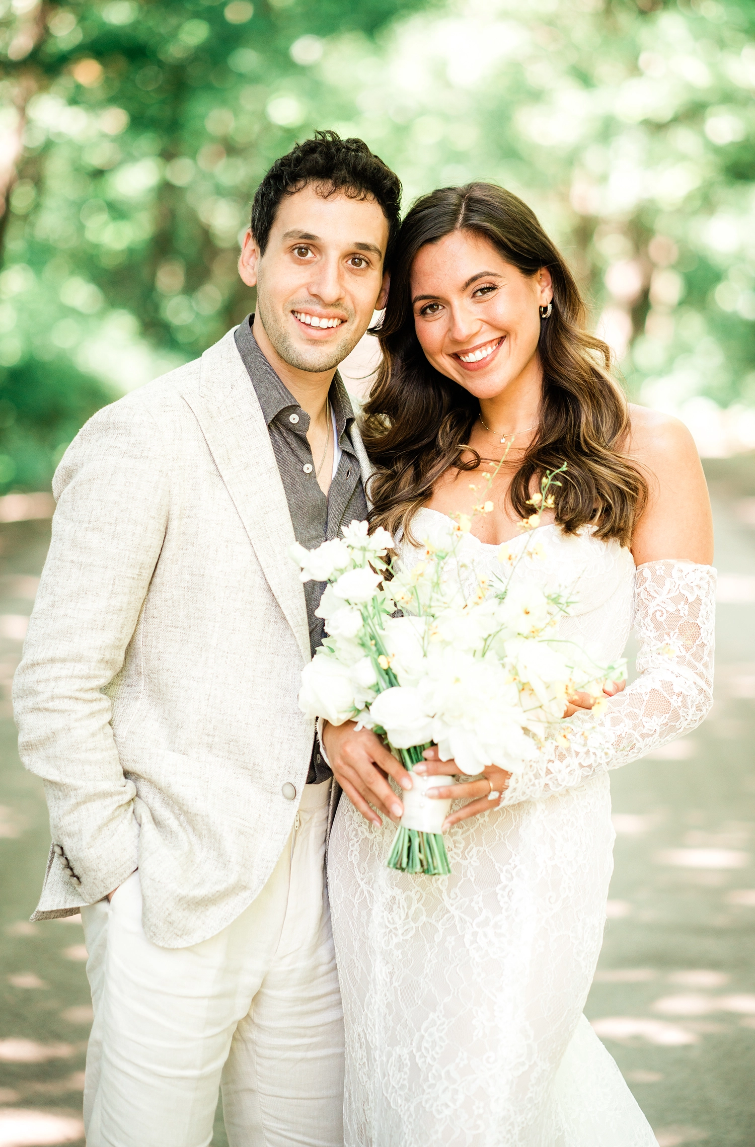Close portrait of the couple in shade at Compass Rose Suites.